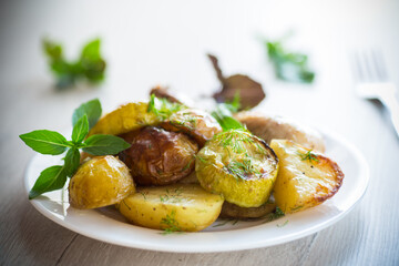 Early baked potatoes with zucchini and chicken