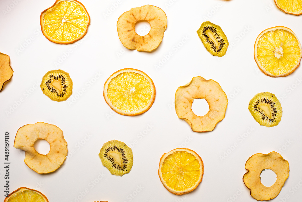 Sticker The dry pieces of different fruits in a row to fresh fruits