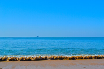 Receding Waves on The Beach