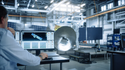 Team of Engineers Working on Satellite Construction. Aerospace Agency International Space Mission: Diverse Group of Scientists Developing Spacecraft, Calculate Orbital Trajectory Tracking on Computer