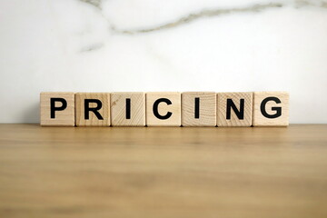 Pricing word from wooden blocks