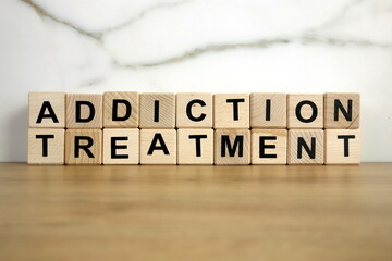 Addiction treatment text from wooden blocks