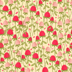 Cute delicate seamless pattern featuring pink and red clover on a light yellow background. - 439165539