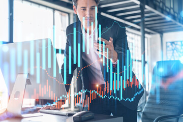 Businessman in suit using smart phone to optimize trading strategy at corporate finance fund. Forex...