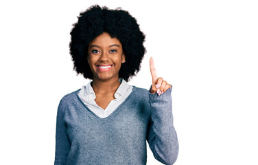 Young african american woman wearing business clothes showing and pointing up with finger number one while smiling confident and happy.