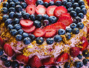 children's anniversary cake, decorated with natural fruits from the garden, for a five-year anniversary celebration