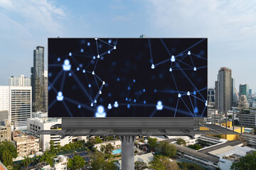 Glowing Social media icons on road billboard over panoramic city view of Bangkok, Southeast Asia. The concept of networking and establishing new connections between people and businesses.