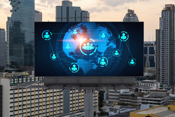 World planet Earth map hologram of social media icons over sunset panoramic cityscape of Bangkok, Southeast Asia. The concept of people connections.