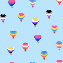 Hot air balloons with pride flags seamless pattern. Heart shaped and regular aerostats. Light blue sky background. Isometric organic flat illustration