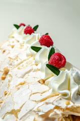 chocolate biscuit cake with nuts. with condensed milk on a white platter High quality photo