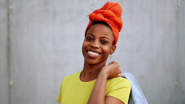 Young woman smiling at the camera
