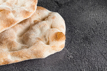 Dough for pinsa romana and scrocchiarella gourmet italian cuisine. Traditional dish in italy. Food delivery from pizzeria.