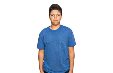 Teenager hispanic boy wearing casual clothes puffing cheeks with funny face. mouth inflated with air, crazy expression.