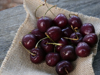 Сherries on a wooden background
