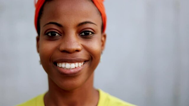 Young woman smiling at the camera
