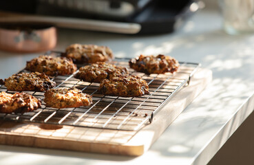 cookies on a wire rack in the kitchen