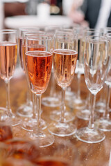 glasses with pink champagne
