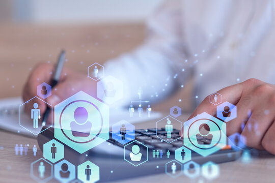 HR specialist researching and analyzing the data of salary on employment market to forecast ongoing expenses of the company using calculator. Hiring new talented officers. Social media hologram icons