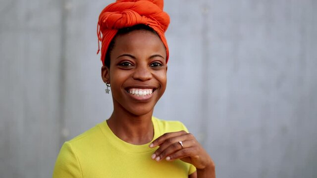 Young woman smiling at the camera

