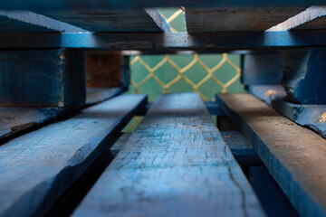 Wooden crates painted in blue, looking inside with perspective