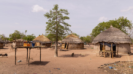 North Ghana traditiona bush grass hut village Panorama. Northern region of Ghana. Rural traditional...