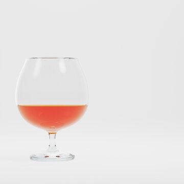 Glass with alcohol on bright background