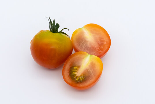 Fresh tomato isolated on white background.