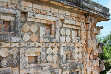 Architectural details of the ancient building on the territory of the Uxmal historical site, Mayan city, representative of the Puuc architectural style, Yucatan, Mexico