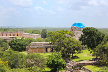 Fototapeta premium Uxmal, aerial view on Nunnery and the Pyramid of the Magician, view from the top of Great Pyramid situated on the territory of Uxmal archeological and historical site, Yucatan, Mexico