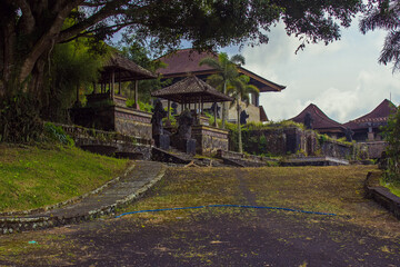 The territory of an abandoned hotel Bedugul Taman Rekreasi Hotel & Resort (also known as Ghost Palace Hotel). Ruins of Balinese hotel is famous landmark for tourists