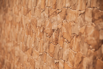 Stone wall surface. Block facade background