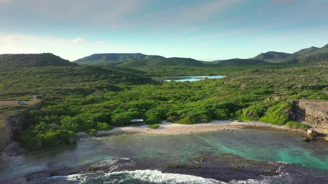 Aerial view above scenery of Curacao, Caribbean with ocean, hills and mountains