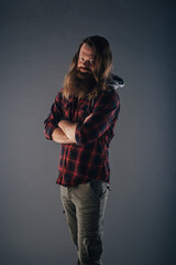 Beautiful strong nordic man with stylish hairstyle and beard on a isolated background.