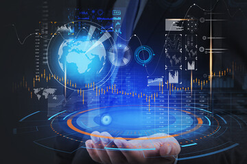 Businessman hand holding a digital hologram, hud with globe and financial icons