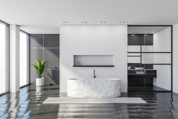White and gray bathroom with tub and sink
