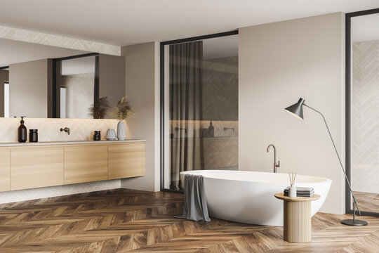 White and glass bathroom corner with tub, sink and shower stall