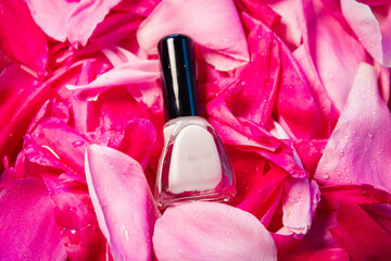Obraz na płótnie Canvas Nail polish in flower petals.