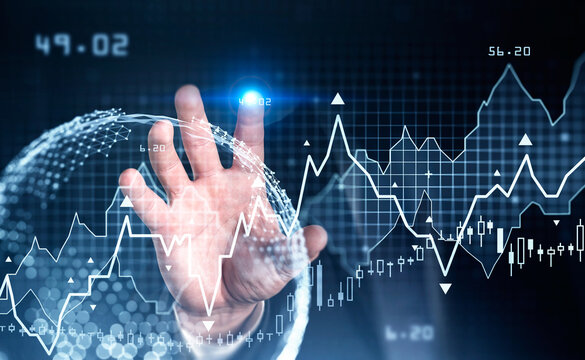 Businessman hand touching digital glass screen with stock market changes. Candlesticks, data information icons and rising graph. Concept of finance and technology. Globe and interface
