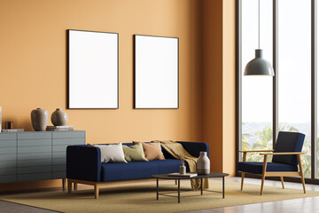 Orange living room corner with sofa, armchairs and two posters
