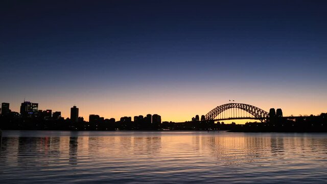 Scenic Sunrise Panorama In City Of Sydney- Darling Harbour To Bridge As 4k.
