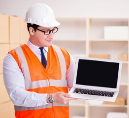 Man working in postal parcel delivery service office