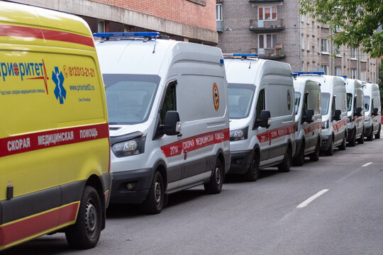 Saint Petersburg, Russia - June 13, 2021: A Line Of Ambulances Wait For The Turn At The Admission Department Of Pokrovskaya Hospital. Due To A Rise In Numbers Of Covid Patients In The City.