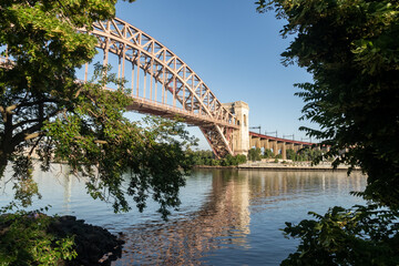 Astoria, NY - USA - June 13, 2021: view of the historic Hell Gate Bridge