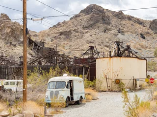 Fotobehang Abandoned car of the Nelson Ghost Town © Kit Leong