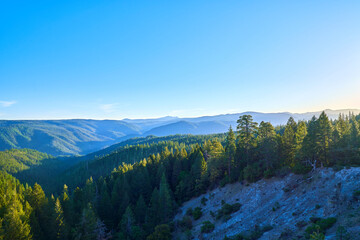 Scenic View of Northern California mountains at sunrise with blue skies 