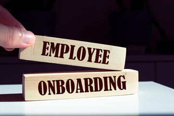 Employee onboarding success symbol. Businessman hand. Business and employee onboarding success concept. Copy space.