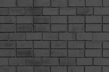 Vintage black stone brick wall pattern and background seamless
