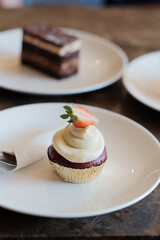 A slice of delicious cup cake. Piece of cup Cake on a Plate. Sweet food. Sweet dessert. Close up.