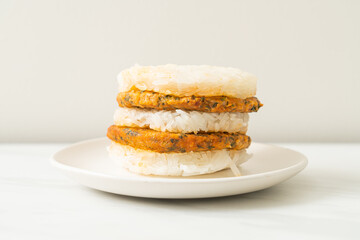 grilled spicy pork and herbs with  sticky rice burger