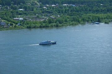 Obraz premium The boat on river on Yenisey, Krasnoyarsk, Russia.